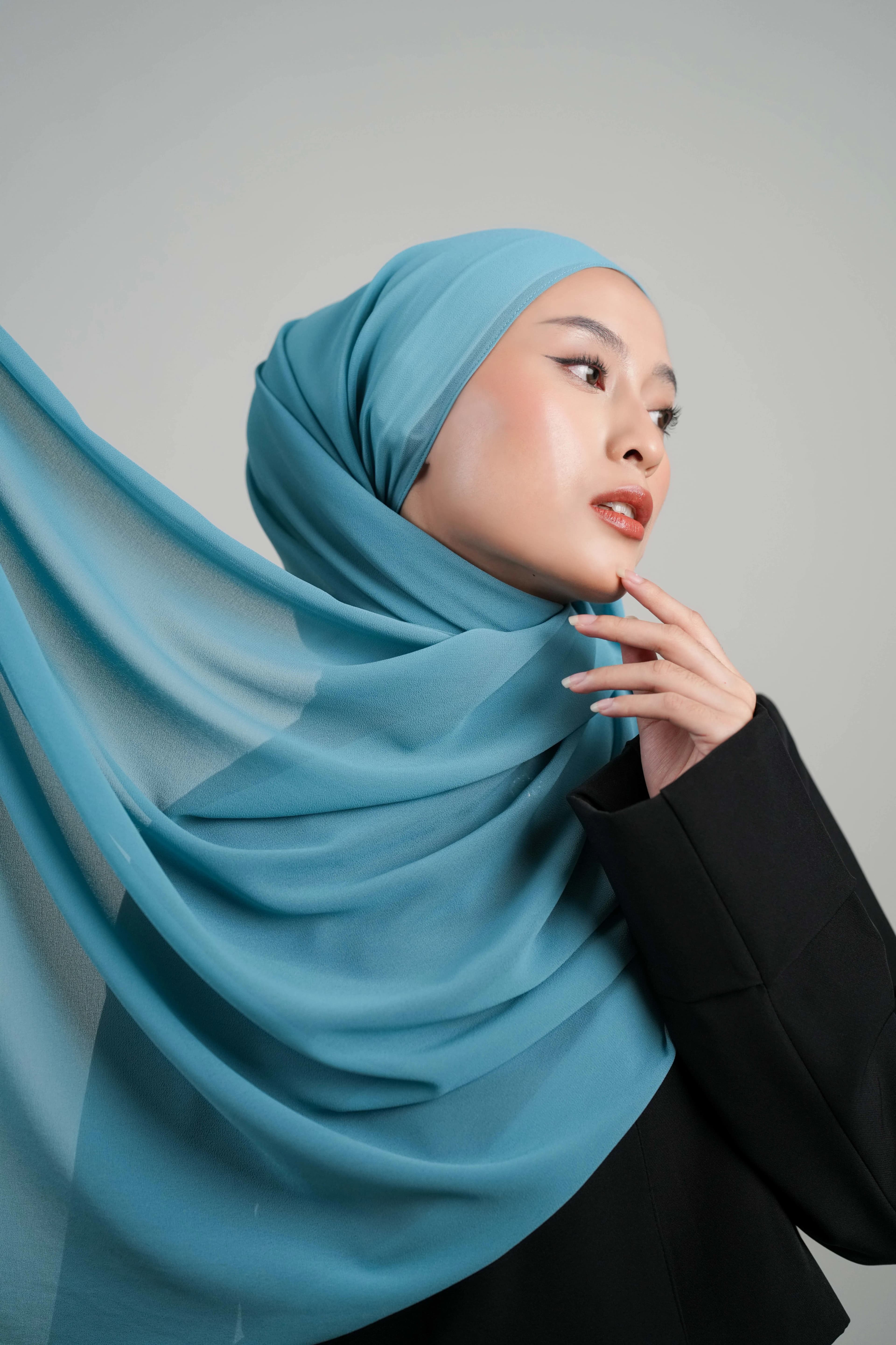 Woman wearing a blue hijab